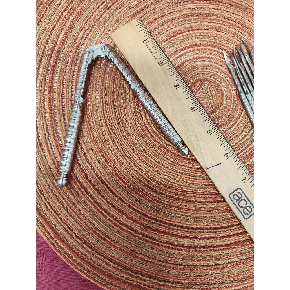 Vintage HMQ Nutcracker With 6 Picks 